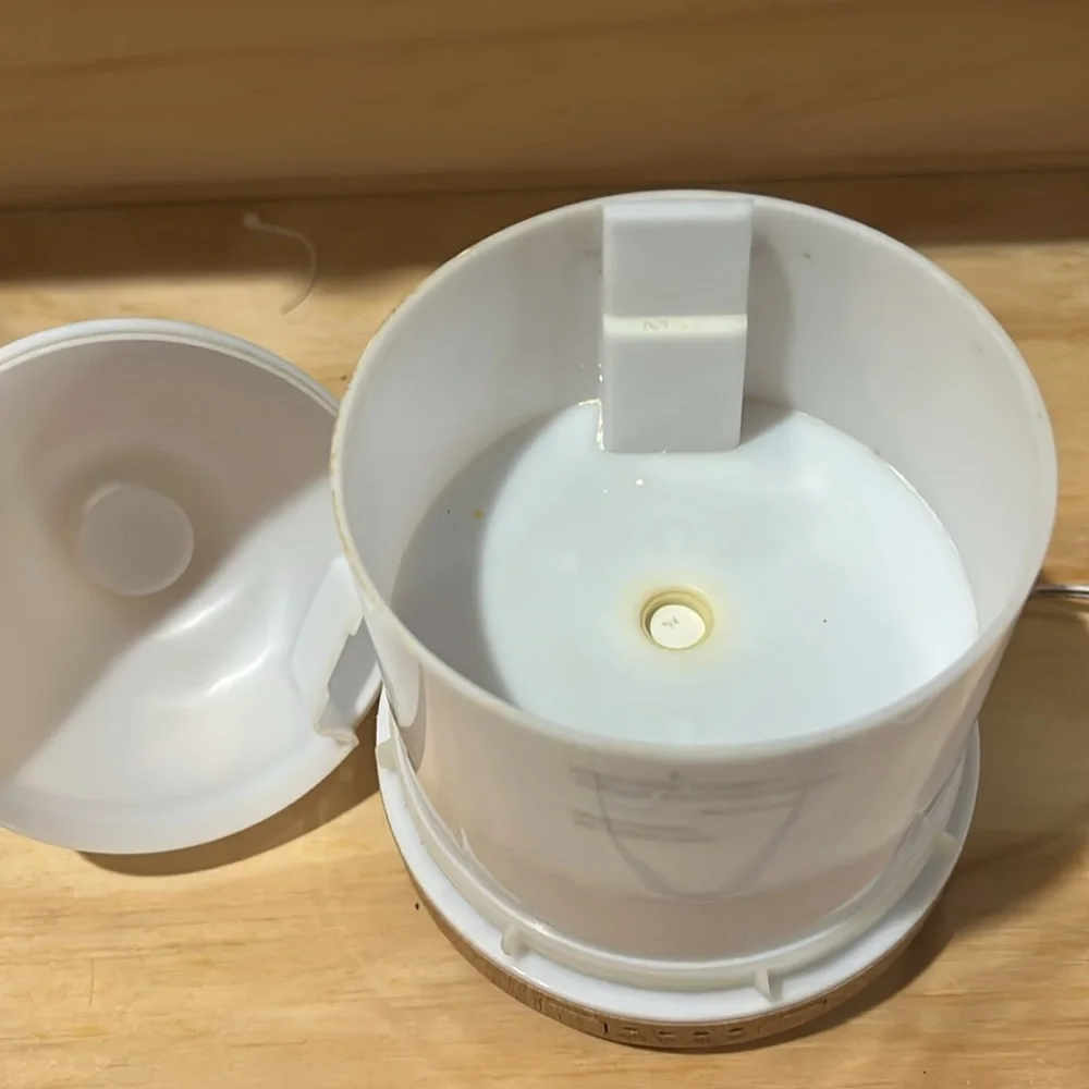 White Ceramic Aromatherapy Diffuser with a bottle of FOCUS essential oil
